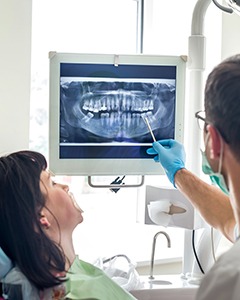 During your dental checkup your dentist will review your X-rays and examine your teeth and gums