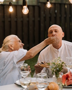 Woman and man sharing a meal