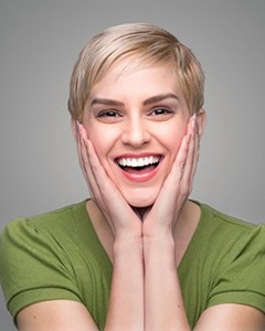 Smiling woman with tooth-colored fillings from her Allentown dentist