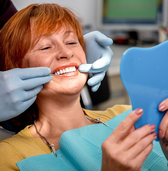 One of the benefits of implant dentures is their natural appearance