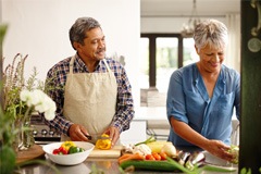 older couple preparing healthy foods