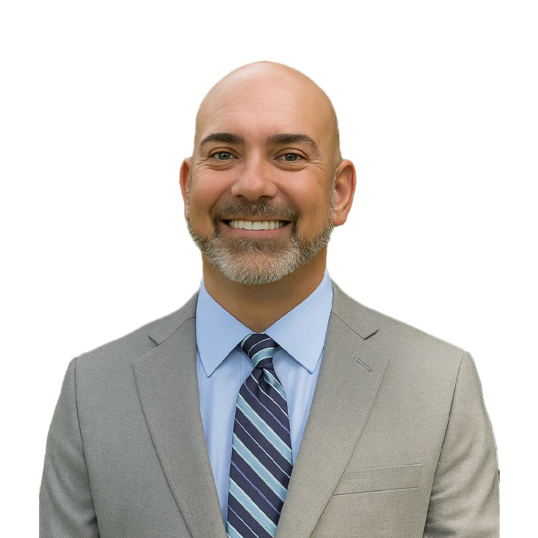 Doctor Young smiling in a gray suit