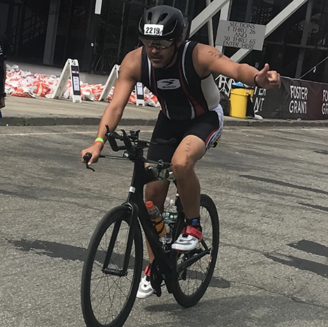 Doctor Young participating in a bicycle race