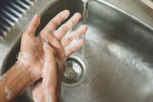 dentist in Allentown washing their hands